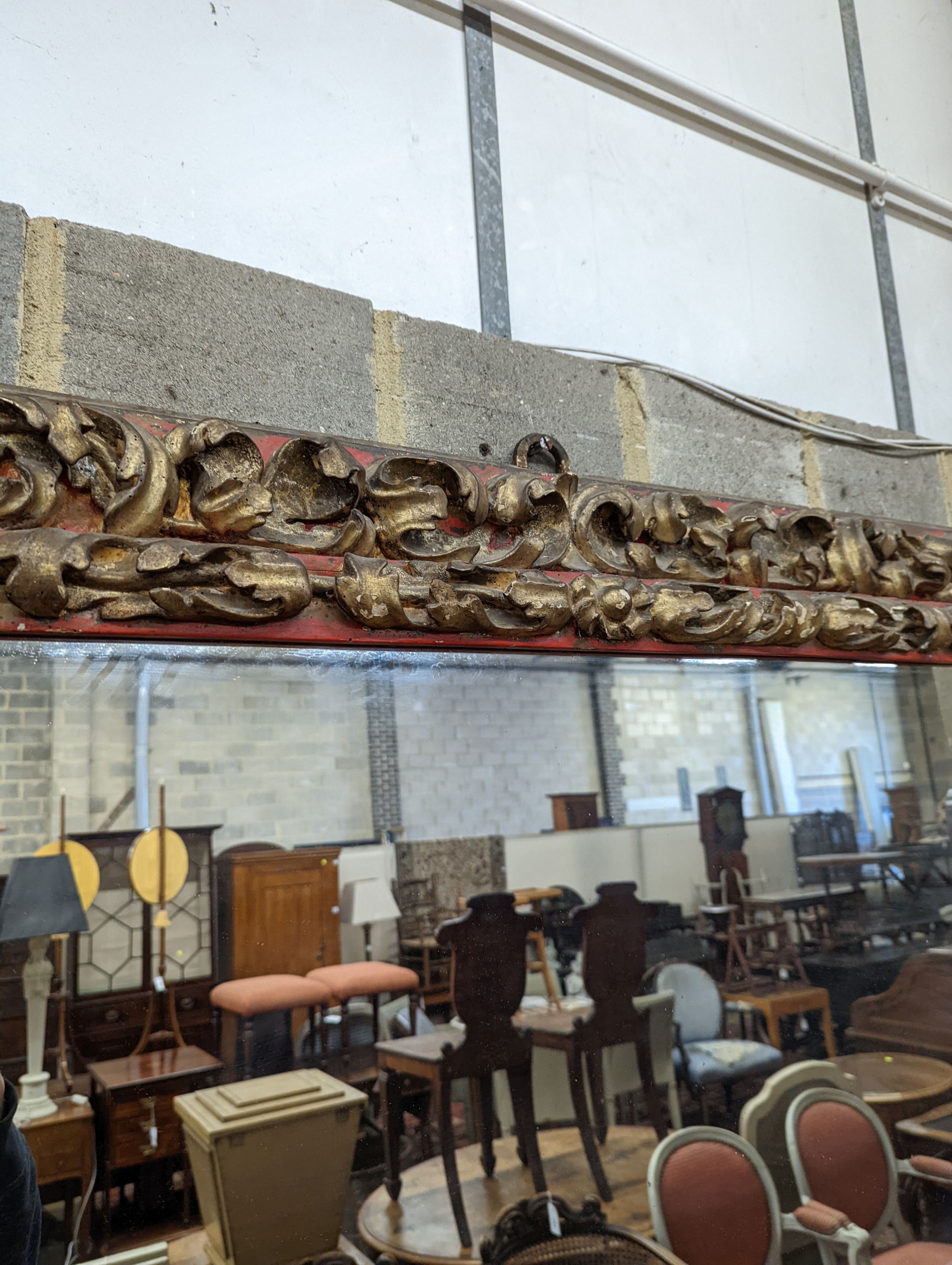 A 19th century carved giltwood rectangular wall mirror, width 140cm, height 76cm